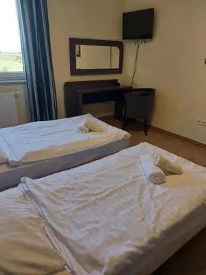 Łóżko lub łóżka w pokoju w obiekcie Gminny Ośrodek Sportu i Rekreacji w Zakrzowie