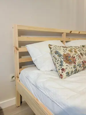 Łóżko lub łóżka w pokoju w obiekcie Apartamenty Zloty Pociąg