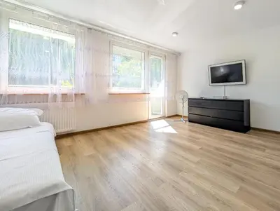 Telewizja i/lub zestaw kina domowego w obiekcie Hiszpańska Harmony Apartment by BookingHost