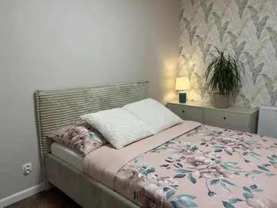 Łóżko lub łóżka w pokoju w obiekcie Komfortowe Planty Racławickie