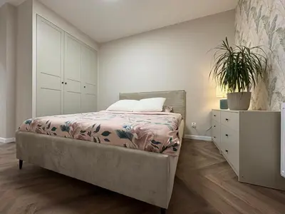 Łóżko lub łóżka w pokoju w obiekcie Komfortowe Planty Racławickie