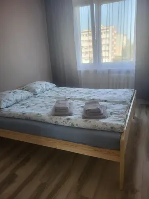 Łóżko lub łóżka w pokoju w obiekcie Panorama
