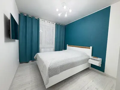 Łóżko lub łóżka w pokoju w obiekcie Apartament nad Zalewem