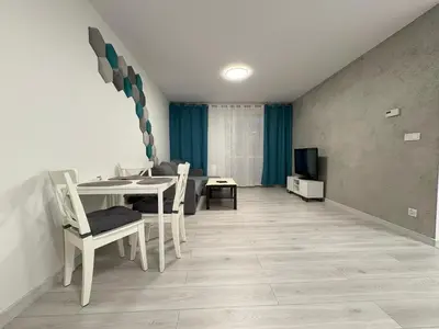 Telewizja i/lub zestaw kina domowego w obiekcie Apartament nad Zalewem