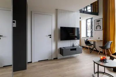 Telewizja i/lub zestaw kina domowego w obiekcie Close-Golden Apartments Wroclaw - Stylish Loft Apartment - Great Location &Jana Pawła33