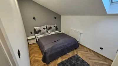 Łóżko lub łóżka w pokoju w obiekcie Studio za Miastem