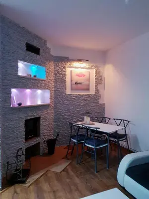 Telewizja i/lub zestaw kina domowego w obiekcie Apartamenty Biały Kamień