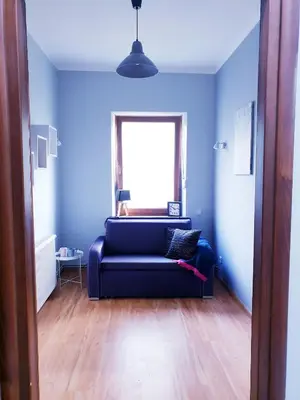 Łóżko lub łóżka w pokoju w obiekcie Apartamenty Biały Kamień
