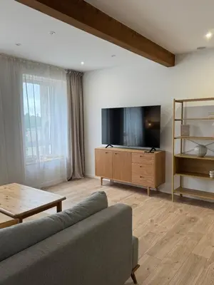 Telewizja i/lub zestaw kina domowego w obiekcie Apartament Między Szlakami
