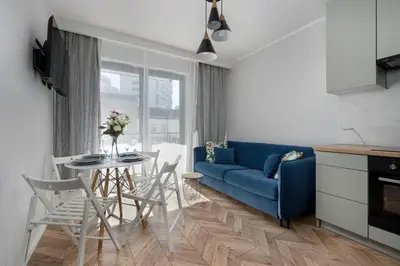 Część wypoczynkowa w obiekcie Tasteful Apartment Near Centennial Hall by Noclegi Renters