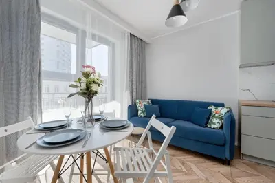 Część wypoczynkowa w obiekcie Tasteful Apartment Near Centennial Hall by Noclegi Renters