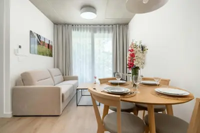 Część wypoczynkowa w obiekcie Księcia Witolda 60 Stylowy Apartament w Klimatycznym Budynku by Noclegi Renters