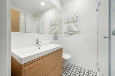 Łazienka w obiekcie Księcia Witolda 60 Stylowy Apartament w Klimatycznym Budynku by Noclegi Renters