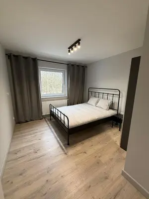 Łóżko lub łóżka w pokoju w obiekcie Property Apart - Work & Stay Suites
