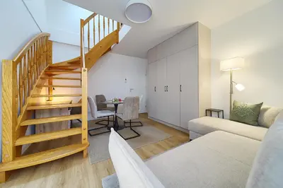 Część wypoczynkowa w obiekcie Reja Comfy Elegance Apartment by BookingHost