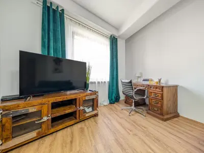 Telewizja i/lub zestaw kina domowego w obiekcie Rynek Wrocław Prestige Apartaments by BookingHost
