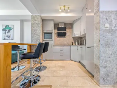 Kuchnia lub aneks kuchenny w obiekcie Rynek Wrocław Prestige Apartaments by BookingHost
