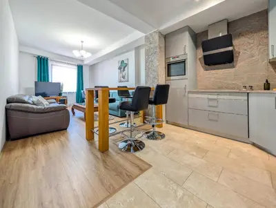Telewizja i/lub zestaw kina domowego w obiekcie Rynek Wrocław Prestige Apartaments by BookingHost