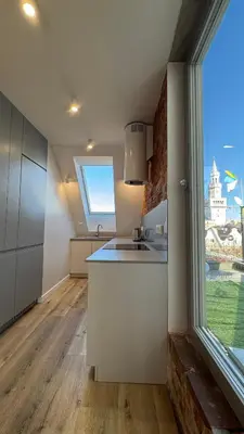 Kuchnia lub aneks kuchenny w obiekcie OPOLSKA WENECJA-apartament typu STUDIO z tarasem