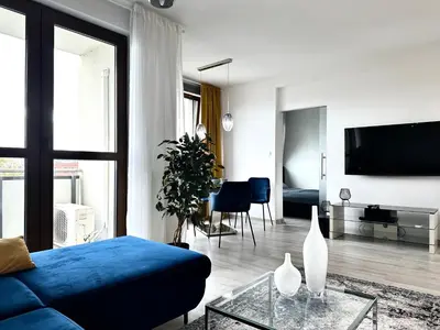 Telewizja i/lub zestaw kina domowego w obiekcie PODWALE 2 Apt 31 - Self Check-In 20h - Parking & Lift