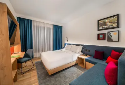 Łóżko lub łóżka w pokoju w obiekcie Hampton By Hilton Wroclaw Airport