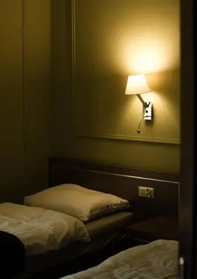 Łóżko lub łóżka w pokoju w obiekcie Hotel Granit