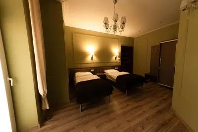 Łóżko lub łóżka w pokoju w obiekcie Hotel Granit