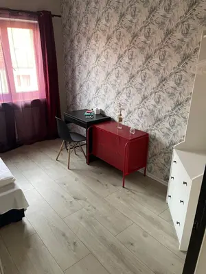 Łóżko lub łóżka w pokoju w obiekcie Lodge