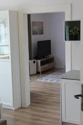 Telewizja i/lub zestaw kina domowego w obiekcie Apartament Sudecki Spokój