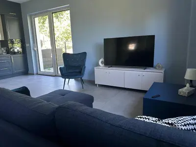 Telewizja i/lub zestaw kina domowego w obiekcie Willa Daisy