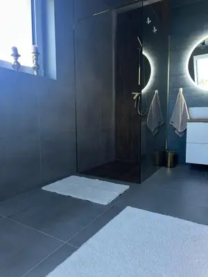Łóżko lub łóżka w pokoju w obiekcie Willa Daisy