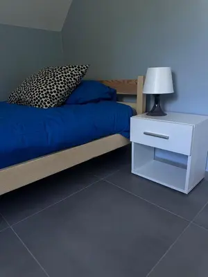 Łóżko lub łóżka w pokoju w obiekcie Willa Daisy