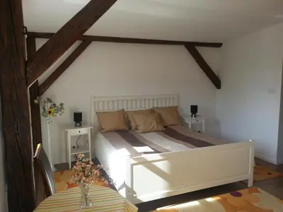 Łóżko lub łóżka w pokoju w obiekcie Dom Gościnny Brama Sudecka