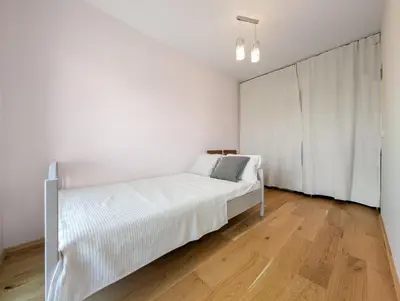 Łóżko lub łóżka w pokoju w obiekcie Wichrowa Comfort Zone Apartment by BookingHost