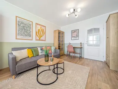 Część wypoczynkowa w obiekcie Szybowcowa Homely Apartment by BookingHost