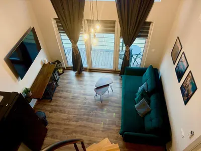 Telewizja i/lub zestaw kina domowego w obiekcie Vista - Domek Wakacyjny w Górach Sowich