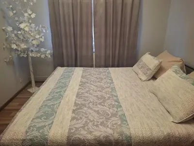 Łóżko lub łóżka w pokoju w obiekcie Apartament Świdnicka