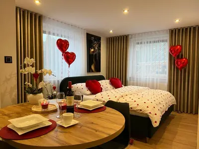 Łóżko lub łóżka w pokoju w obiekcie Apartamenty nad Starynką