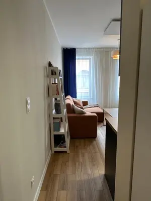 Łóżko lub łóżka w pokoju w obiekcie Apartament Piastów 12