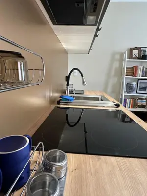 Kuchnia lub aneks kuchenny w obiekcie Apartament Piastów 12