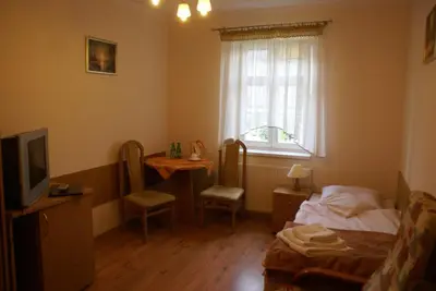 Telewizja i/lub zestaw kina domowego w obiekcie Zameczek