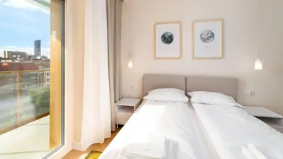 Łóżko lub łóżka w pokoju w obiekcie Royal View - Promenada Staromiejska, parking w garażu w cenie!