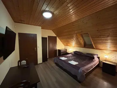 Łóżko lub łóżka w pokoju w obiekcie Chata na Bani w Starej Morawie