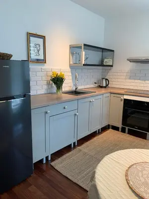 Kuchnia lub aneks kuchenny w obiekcie Apartament Ogrodowa