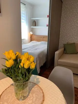 Łóżko lub łóżka w pokoju w obiekcie Apartament Ogrodowa