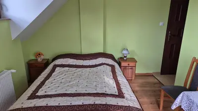 Łóżko lub łóżka w pokoju w obiekcie Agroturystyka Kalinowe Ranczo