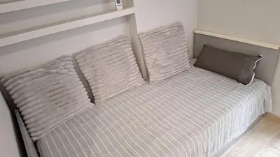 Łóżko lub łóżka w pokoju w obiekcie Apartament TwoTone