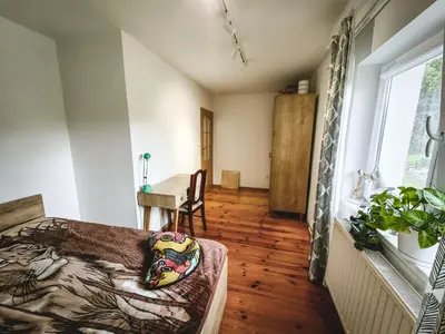 Łóżko lub łóżka w pokoju w obiekcie Sosnowa 61