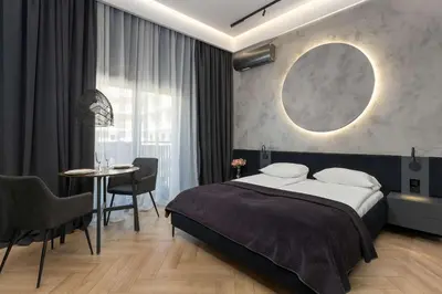 Łóżko lub łóżka w pokoju w obiekcie Modern Studio with Parking and Air Conditioning in the City Center of Wroclaw by Noclegi Renters
