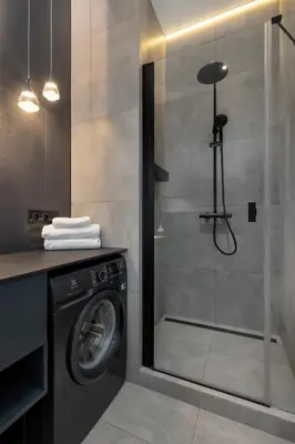 Łazienka w obiekcie Modern Studio with Parking and Air Conditioning in the City Center of Wroclaw by Noclegi Renters